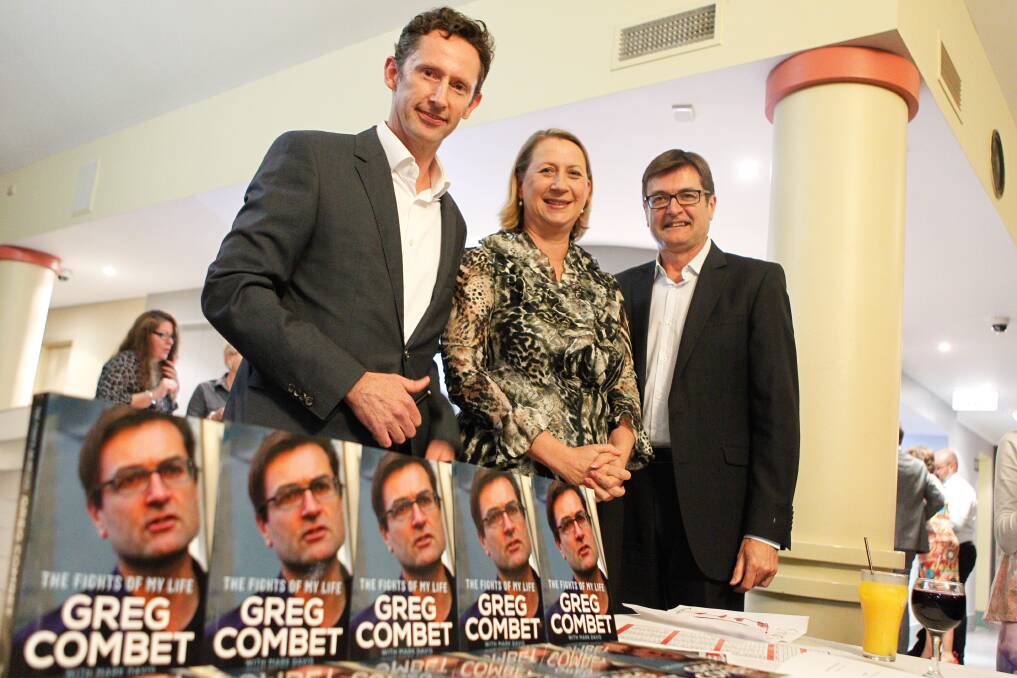 Stephen Jones and Sharon Bird with author Greg Combet at the book launch. Picture: CHRISTOPHER CHAN