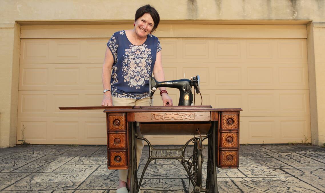 Trish Day will sell a 75-year-old Singer sewing machine at the Garage Sale Trail on Saturday. Picture: ADAM MCLEAN