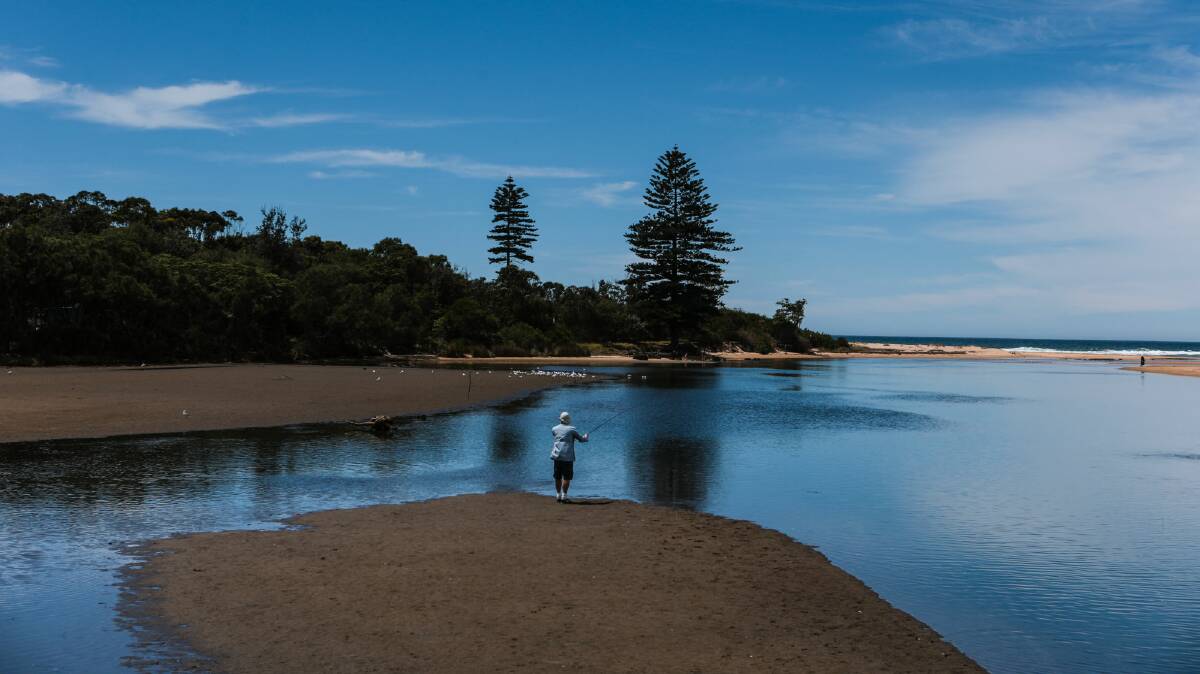 A man fishing at Fairy Creek lagoon in North Wollongong. Picture: ADAM McLEAN