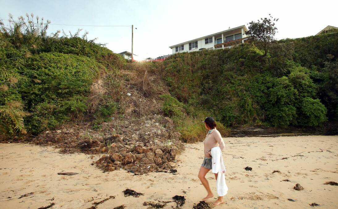 Land drops away sharply on to a headland pathway near a house on Lawrence Hargrave Drive. Picture: KIRK GILMOUR