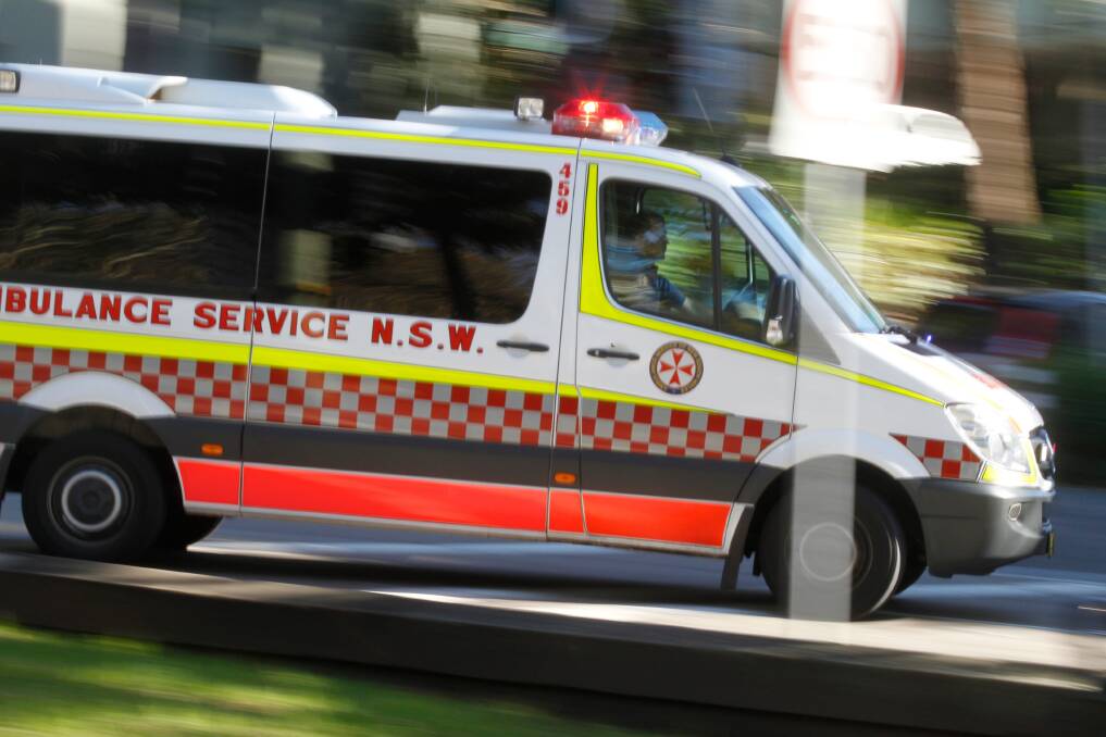Paramedics are helping two people injured in a car crash at Mittagong.
