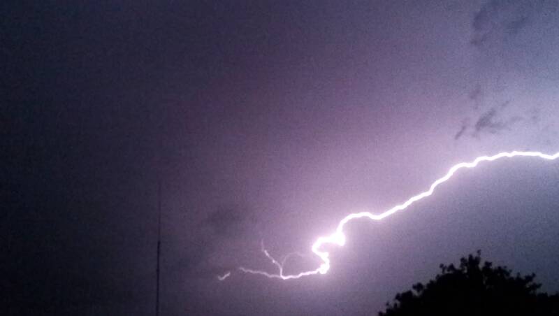 Lightning lashes out across the sky over Oak Flats. Picture: DARREN MALONE