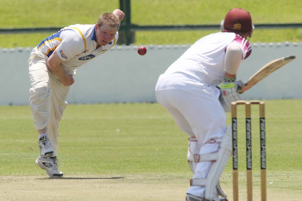 On target: Dapto skipper Dale Scifleet sends down a delivery against Wollongong at North Dalton Park. Dapto are close to claiming a crucial first innings victory. Picture: GREG TOTMAN