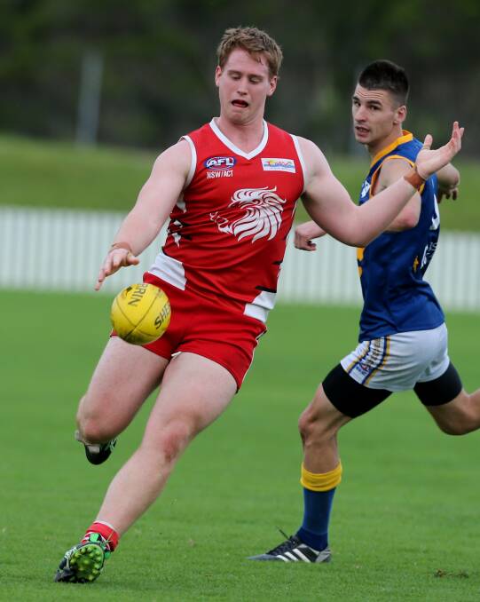 On target: Illawarra Lions' Ryan Wells in action last season. The Lions are considering their future in the Sydney AFL and looking to a move to the South Coast comp in 2015.
