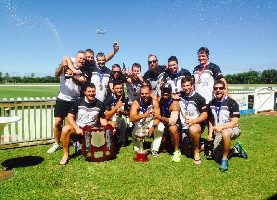 Champs: Balgownie players celebrate winning the premiership with victory over Corrimal at North Dalton Park.
