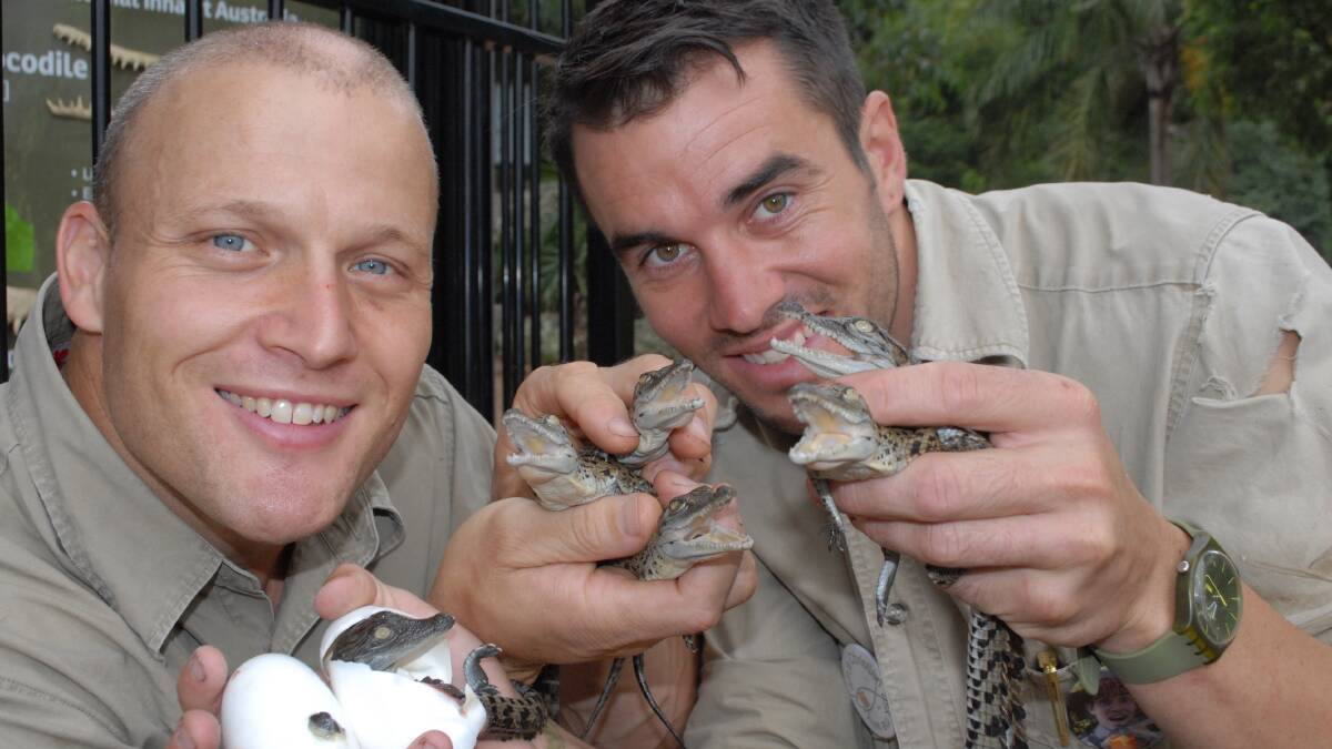 Shoalhaven Zoo owner Nick Schilko with handler Trent Burton who was bitten by a croc during a feeding show on Monday.
