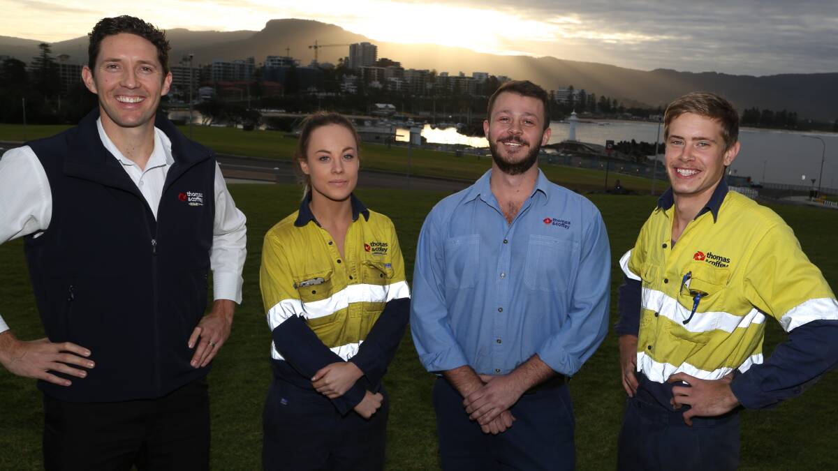 Megan Gregory (second left) with Thomas & Coffey general manager Peter Buckley (left) and workmates Chris Jansen and Brendan den Hoedt. Picture: GREG ELLIS 
