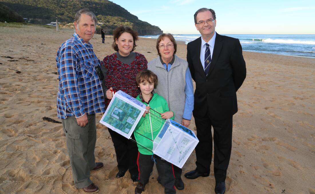 Charles, Rachel, Joshua, Robyn and Lawrence John Hargrave on Stanwell Park Beach on the sight where it all happened more than 100 years ago on eve of the centenary of the death of the Grandfather of Flight Lawrence Hargrave. Picture by Greg Ellis.

