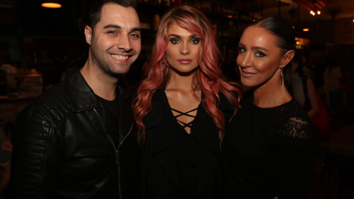 Dimitri Skarvelis, of Entourage Agency, Alex Sinadinovic, of Australia's Next Top Model, and Val Flores, of Minq Body and Beauty, at the Winter Boutique Fashion Parade at Three Chimneys. Picture by Greg Ellis.


