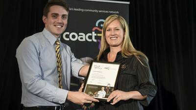 Shaz Harrison-Shaw recently receiving a CoAct Local Heroes Award from CoAct ambassador Matthew Cowdrey in Canberra. 