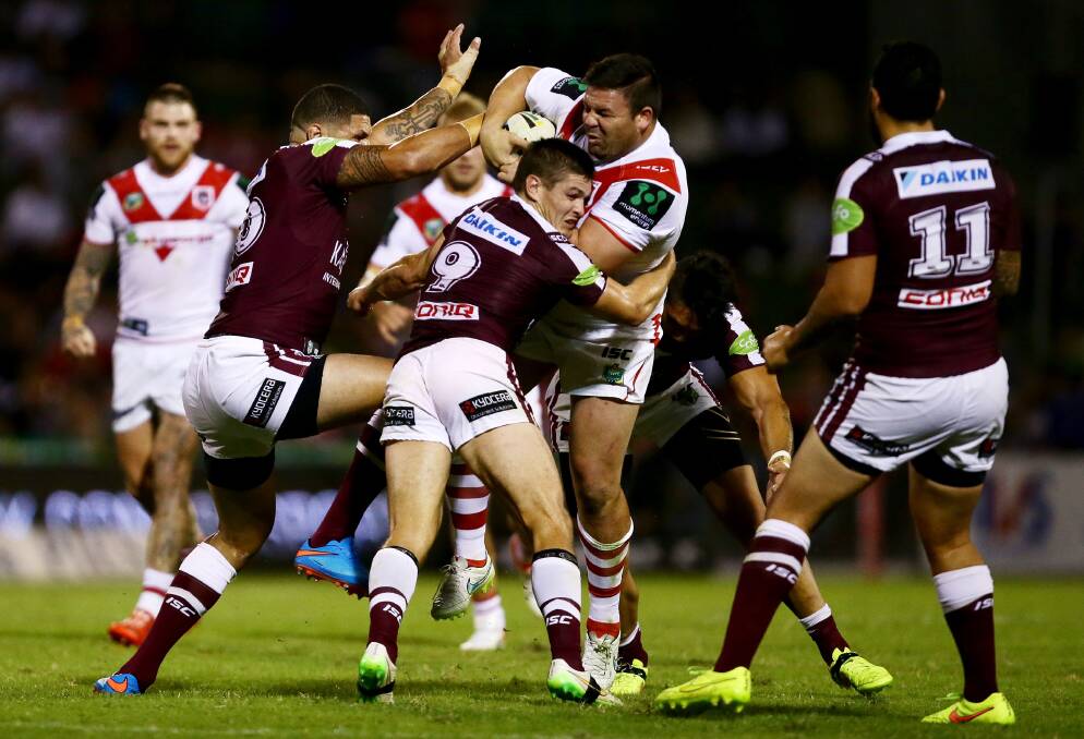 George Rose runs into Manly defence during Saturday's game at WIN Stadium. Picture: ADAM McLEAN
