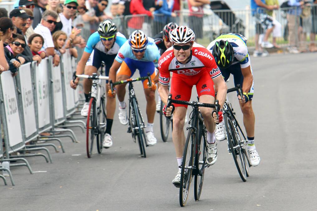 A Wollongong crowd watches on as Tom Palmer wins the Cycling Grand Prix around Flagstaff Hill in 2012.