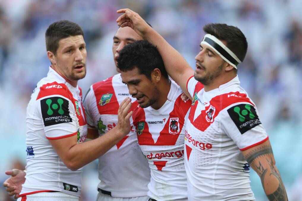 Gareth Widdop (left) celebrates a try with Dragons teammates during Sunday's win over Bulldogs. Picture: GETTY IMAGES