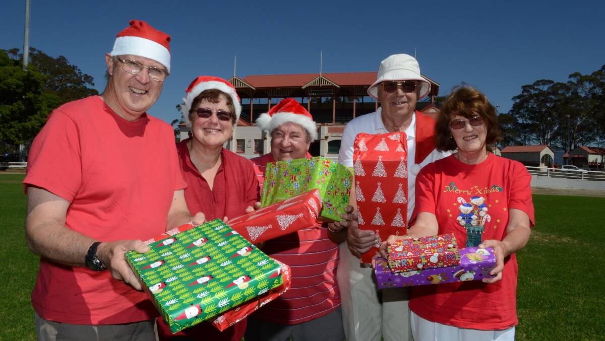 GHOST OF CHRISTMAS PAST: David and Helen Esdaile with John Smith, and John and Anne Wood have had to say goodbye to the successful Charity Christmas Lunch at the Nowra Showground due to lack of volunteer help. Photo: ADAM WRIGHT