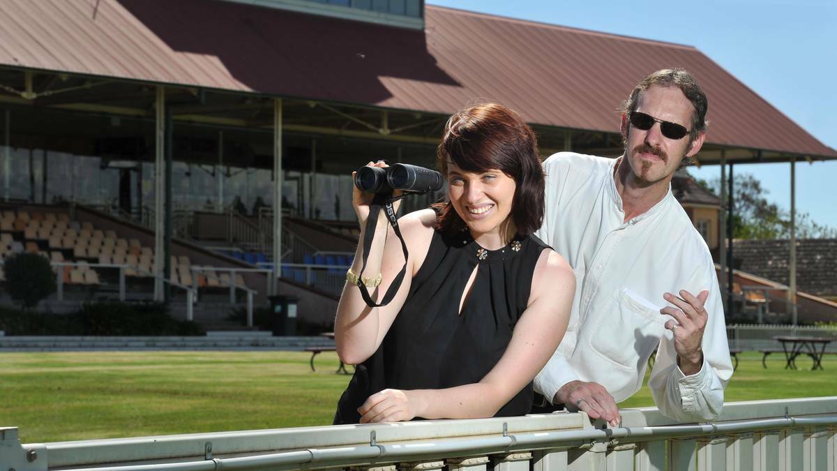 HIGH-STAKES: Stakes associate producers Kate Elizabeth and Ken Hammond act the part at a shoot location at Murrumbidgee Turf Club. Picture: Michael Frogley – the Daily Advertiser