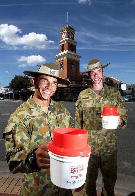 Troopers Szabi Varga and Alistair Perkins collect money for Red Cross Calling in central Albury yesterday. Picture: KYLIE ESLER The Border Maik