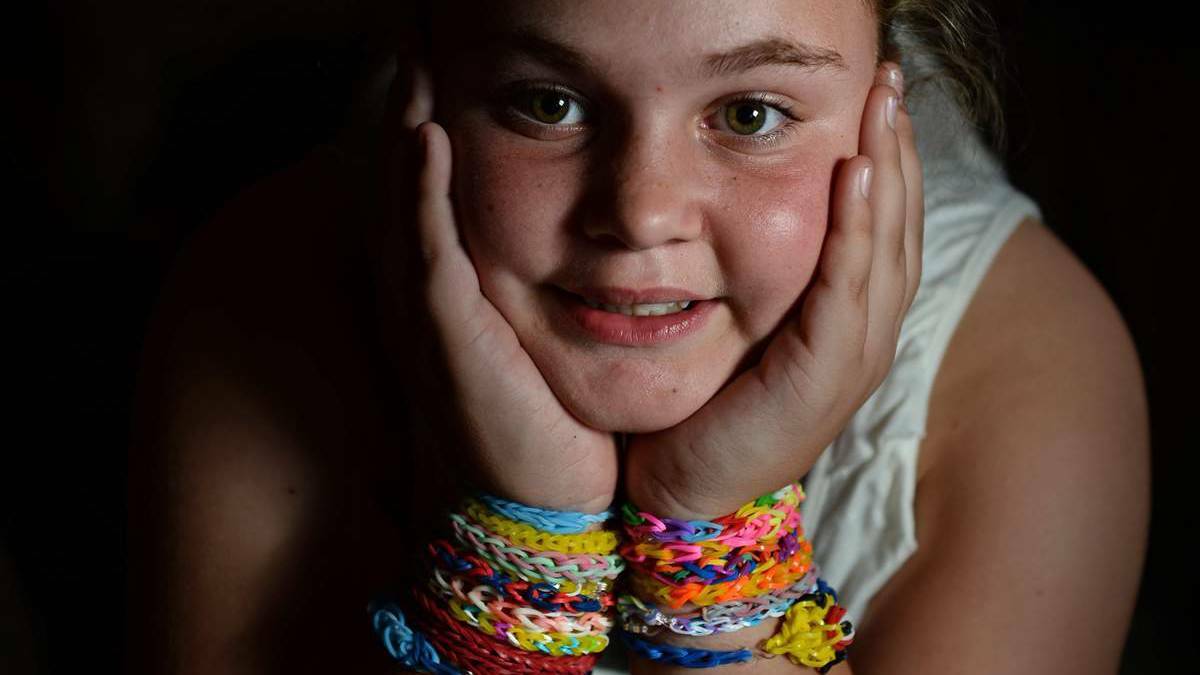 SKILLED: Ashley Robson, of Woodberry, enjoys looming. Picture: Marina Neil- The Newcastle Herald