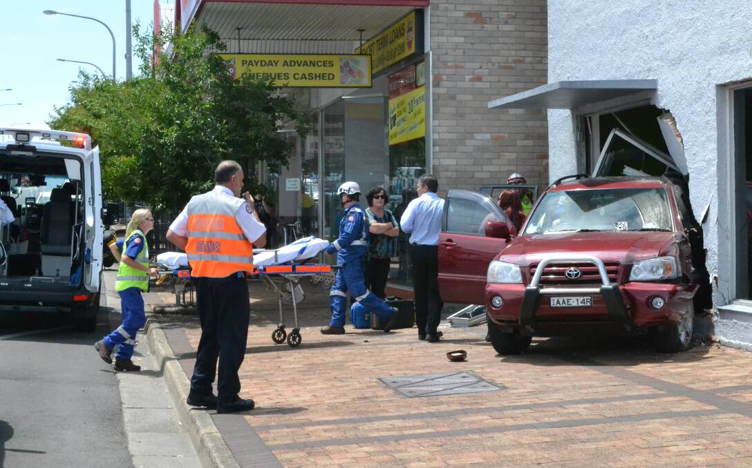 LUCKY ESCAPE: Miraculously no one was seriously hurt when this vehicle careered across busy Kinghorne Street in reverse and smashed into the gym at the corner of Worrigee Street.