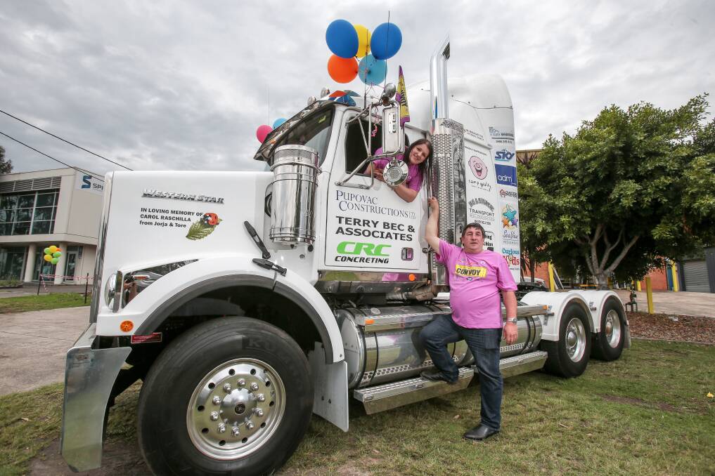 LEAD TRUCK WINNER: Rob Starcic with his daughter Bianca Starcic, at Coastal Windows and Doors Unanderra. Picture: Adam McLean.