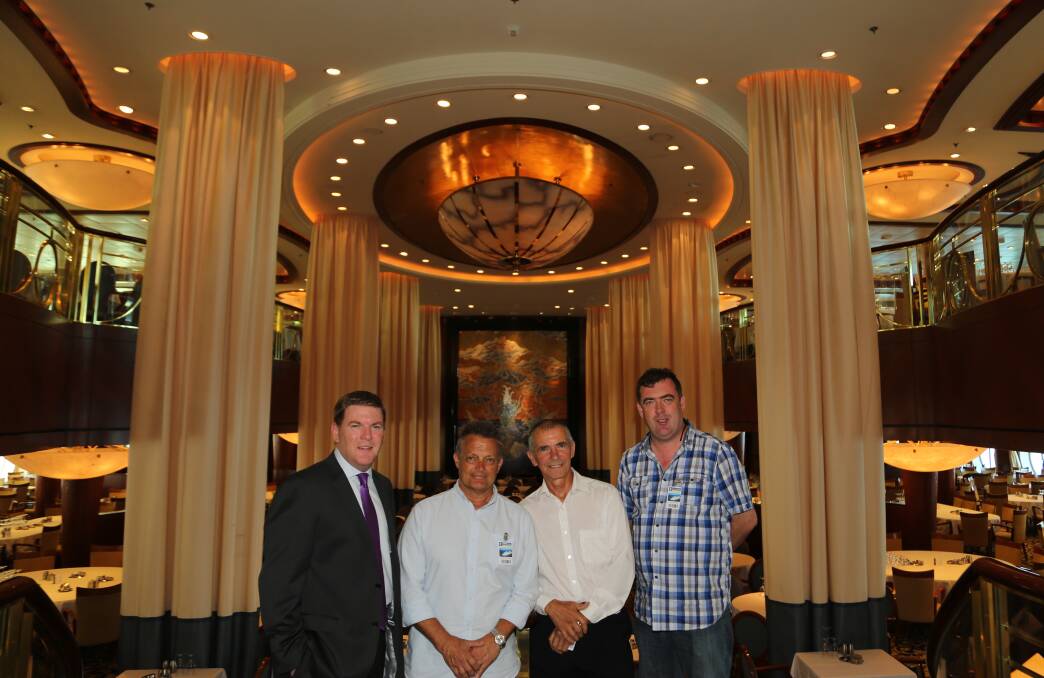 Talking big exciting business and tourism: Gavin Smith, Cr Leigh Colacino, Dom Figliomeni and Mark Sleigh in one of the main dining areas on Radiance of the Seas. Picture: Greg Ellis.
