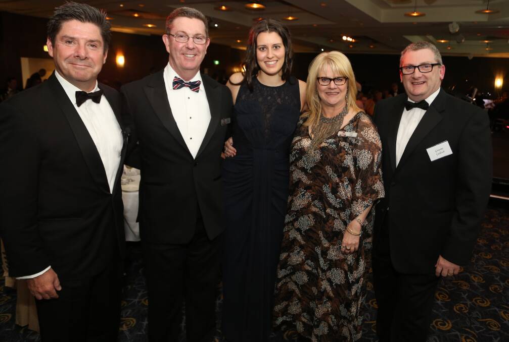 Licenced to thrill: At the TIC dinner were author Chris Allen, TIC deputy president Graham Lancaster and Climate Girl Parrys Raines with dinner sponsors Vicki Tiegs and Graeme Gulloch of Waples Marketing Group. Picture: Greg Ellis.

