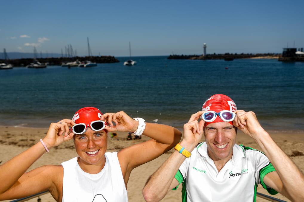 Get ready: Grace Musgrove and Rob Battoccio at Wollongong Harbour preparing for the 2018 Aquathon. Photo: Adam McLean


