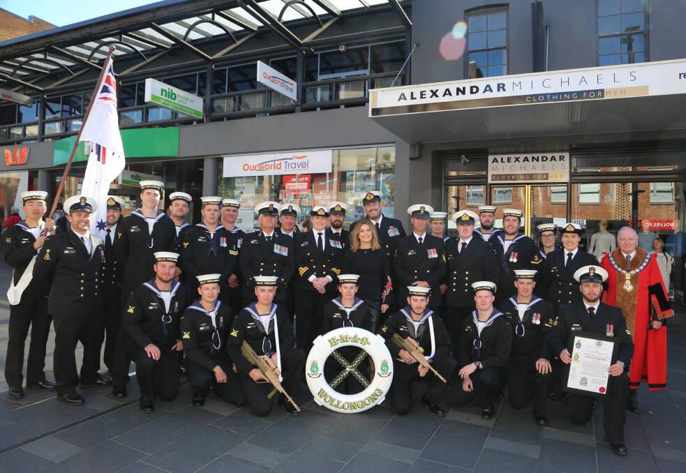 Final moment: The crew of HMAS Wollongong pose for a photo with Lord Mayor Gordon Bradbery just after being granted the Freedom of Entry to the city their ship is named after. Picture: Greg Ellis.
