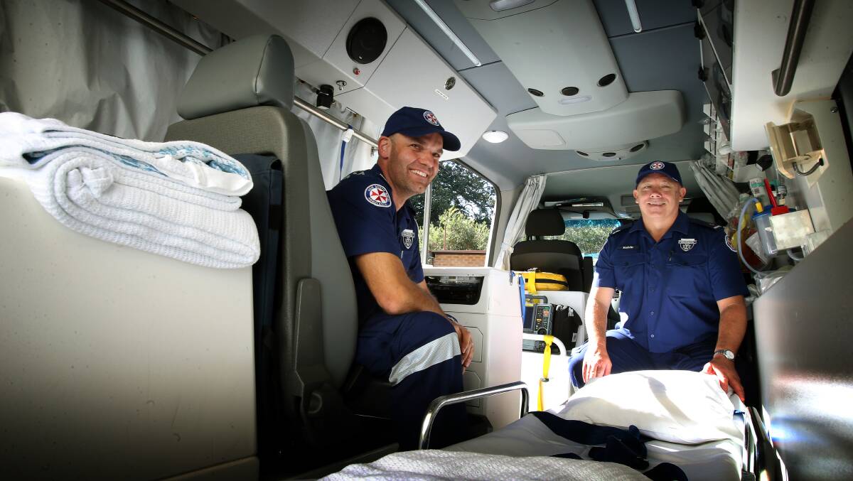 Recognition: Paramedic David Kay and operations manager Kelvin Milne. Picture: Sylvia Liber.
