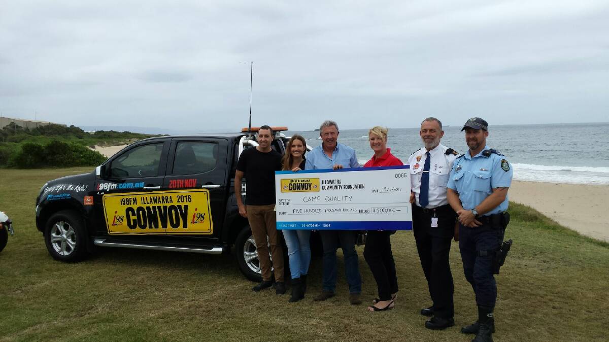 Applications open: i98FM Breakfast Show hosts Ryan Cram, Christie Hayes & Marty Haynes with Camp Quality CEO Kylea Tink and i98FM Illawarra Convoy committee representatives Norm Rees and Stewart Arnold.

 