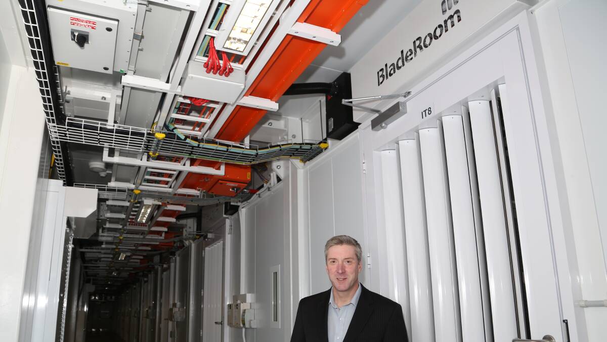 EXPANDING CLOUD IN WOLLONGONG: Metronode's Alex Young inside the NSW Government's revolutionary new Unanderra data centre. Picture: Greg Ellis.
 