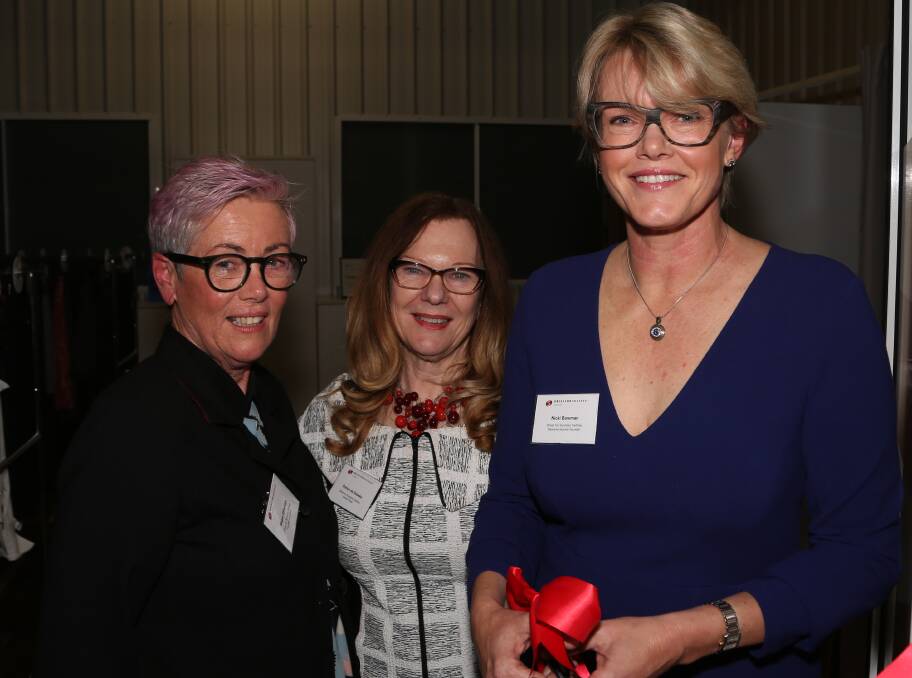 Charity showroom opening: Dress for Success Sydney founder and patron Megan Etheridge, Dress For Success Sydney board chair Robyn de Szoeke and Dress For Success Illawarra Management Committee founder Nicki Bowman. Picture: Greg 
Ellis.
\
.