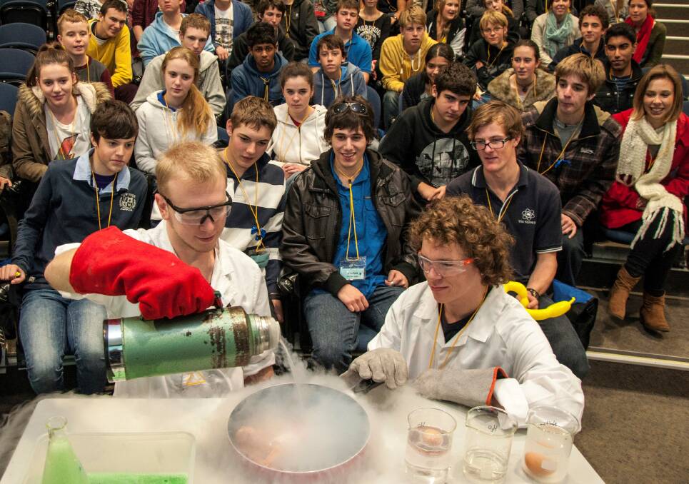 Young scientists: An experiment being conducted at a University of Wollongong ConocoPhillips Science Experience day.
