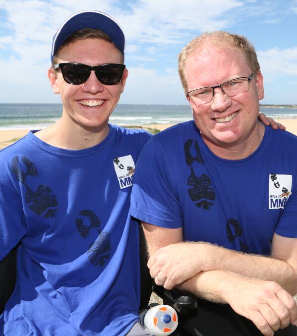 Ben Oakley and Michael Oakley during the walk for Motor Neurone Disease at Bulli on Sunday. Picture: Greg Ellis.