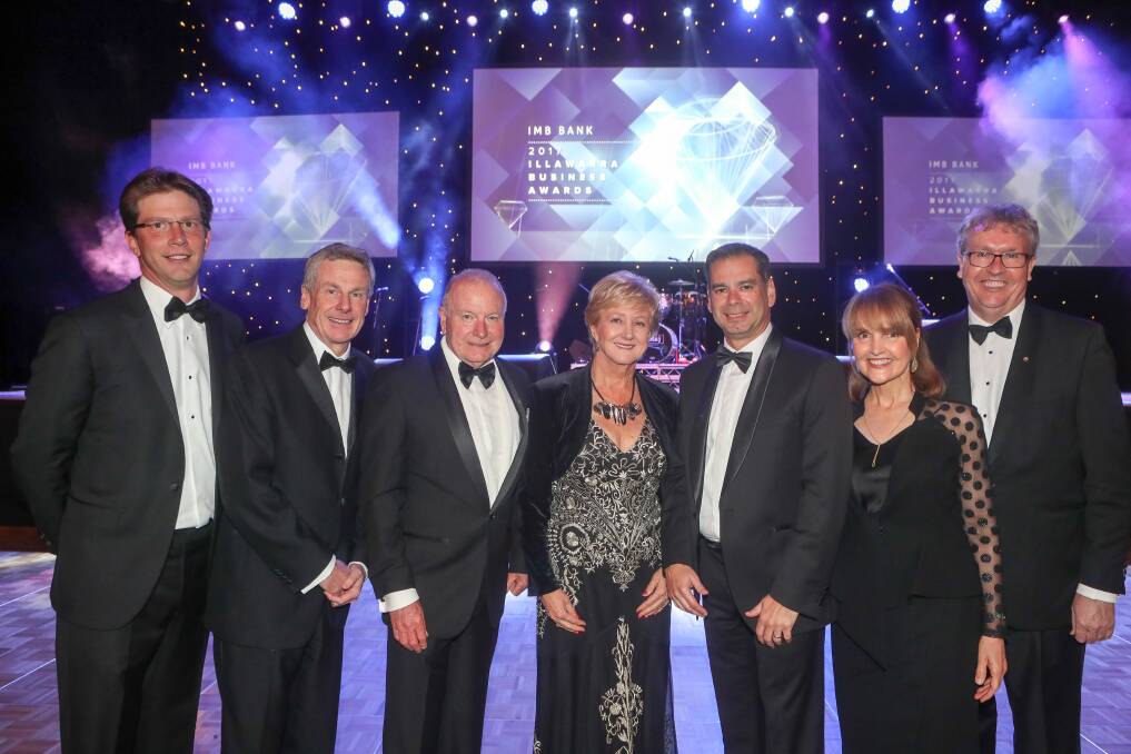 Outgoing Illawarra Business Chamber executive director Chris Lamont at the recent business awards with Robert Ryan, Wollongong Lord Mayor Gordon Bradbery, Janine Cullen, ​Warwick Shanks, Annette Wellings and Professor Paul Wellings. Picture: Adam McLean

