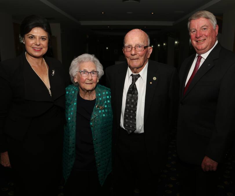 ALL SMILES: IRT chief executive Nieves Murray with Thelma Kohn, 94, and Keith Davis, 92,  on their birthdays and outgoing IRT chairman Bruce Allan. Picture: Greg Ellis
