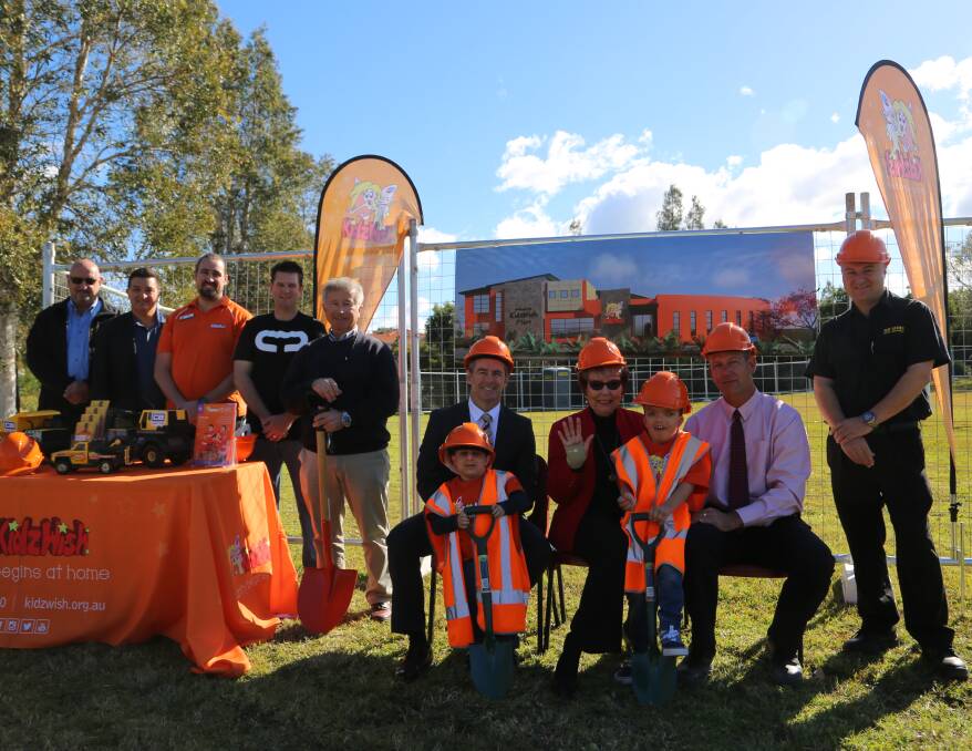 Chris Beaven with Leo Lagana and Ben Giudice and supporters from Piruse Constructions,  KFW, Cleary Brothers, Go Hire, Spinelli Real Estate, Austral Bricks, Thomas Creative and Maguire & McInerney at the site of the new KidzWish Place in Flinders. Picture: Greg Ellis.
