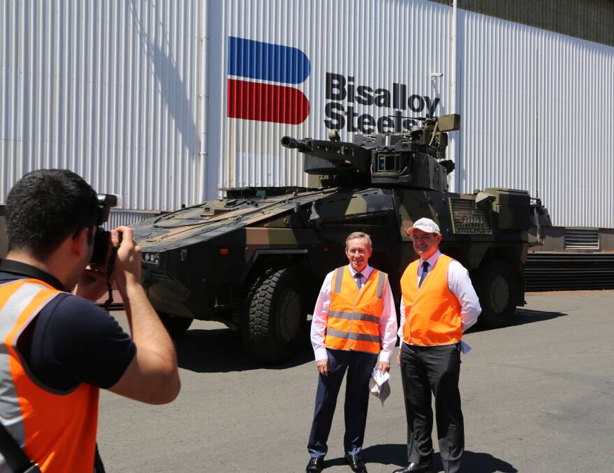 Business allies: Bisalloy Steel Group's Greg Albert and Rheinmetall Defence Australia's Gary Stewart. Picture: Greg Ellis.


