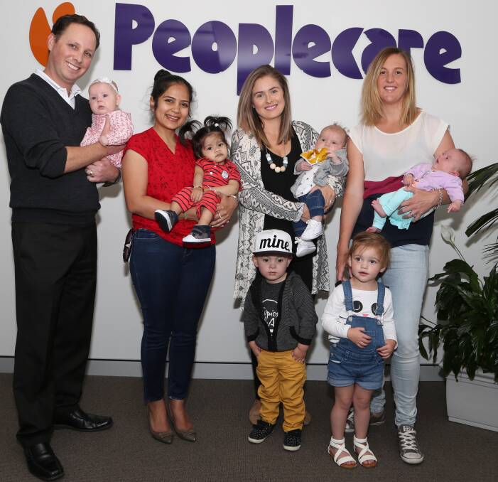 People-friendly business: New dad Cameron and baby Alyssa McIntrye, Janki and Mivaan Dave, Hayley, Jack and Ollie Windisch and Abbie, Ellen and Taylor Chapman. Picture: Greg Ellis.

