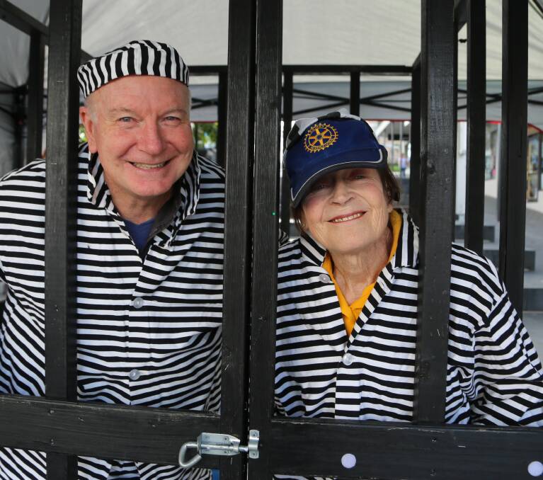 Locked up: Wollongong Lord Mayor Gordon Bradbery and Wollongong Rotarian Dot Hennessy Doing Time for Kids in Crown Street Mall. Picture: Greg Ellis.
