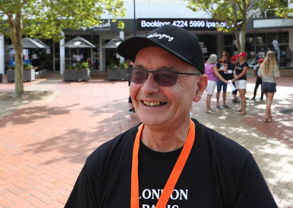 Cruise seachange: Stuart Barnes was all smiles in the Wollongong Arts Precinct as he welcomed passengers from Voyager of the Seas. Picture: Greg Ellis.
