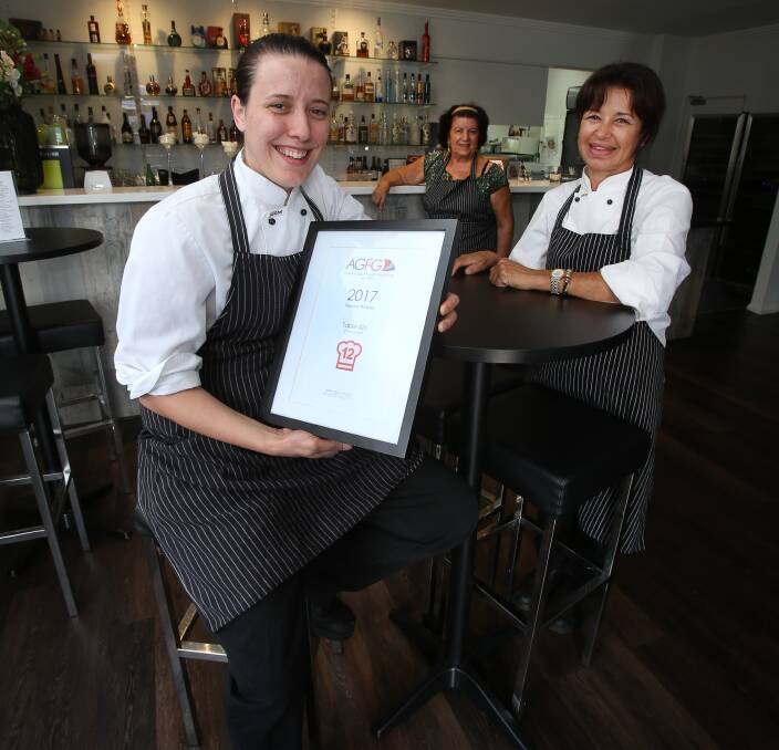 Keeping it in the family: Nataly Sanchez with her grandmother Margherita Tatangelo and mother Marisa Tatangelo-Ferri at the award-winning Table 426 in Corrimal. Picture: Robert Peet.


