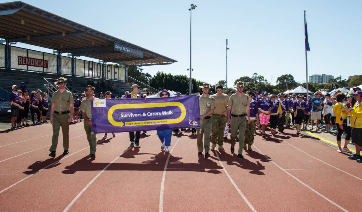 Start: The end of the first lap for survivors and carers at the 2016 Wollongong Relay for Life. Picture: Georgia Matts.
