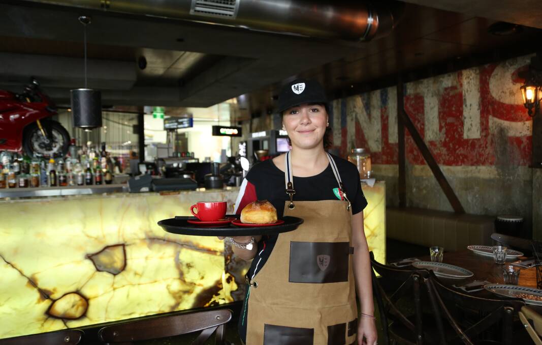 Friendly staff and fine food: Inside Criniti's Darling Harbour. Picture: Greg Ellis.
