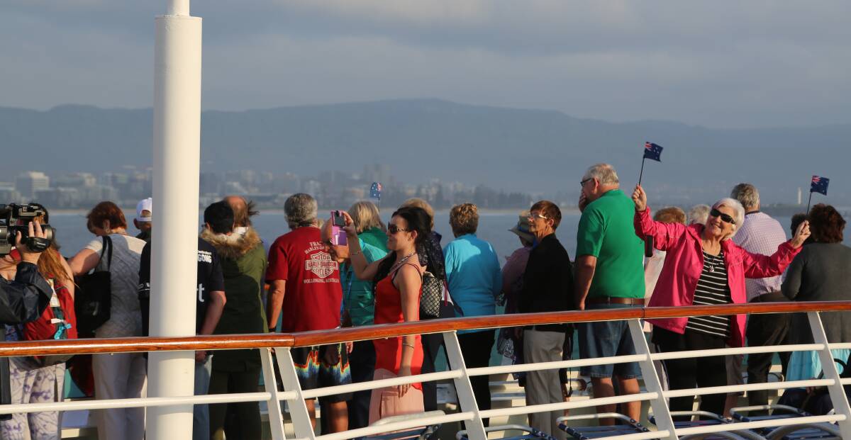 Early risers: Deck 12 was filled with passengers from 6am on Sunday all eager to catch their first few of Wollongong. 
.
  