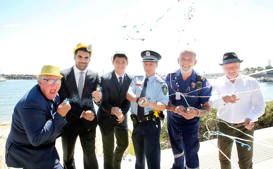 New Year's Eve launch: Steve Wisby, Shadi Hajj, Kane Baker, NSW Police chief inspector Mark Walker, NSW Ambulance paramedic Norm Rees and Lord Mayor Gordon Bradbury at Wollongong Harbour. Pic Sylvia Liber
