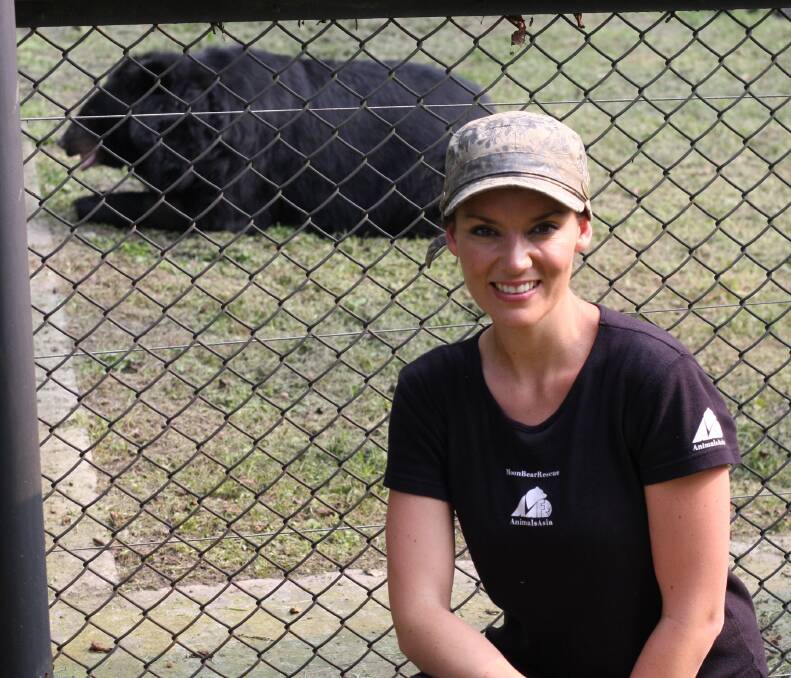 Moon Bear carer:  Kristie Poole at an Animals Asia Foundation rescue sanctuary in Asia. 
