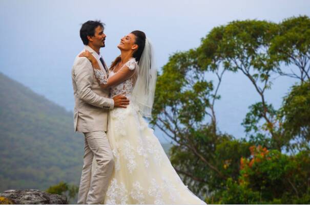 Newlyweds: US based fashion designers Rick Caballo and Melissa Core at Tumbling Waters Retreat overlooking Stanwell Park. Picture: Andy Zakeli.

