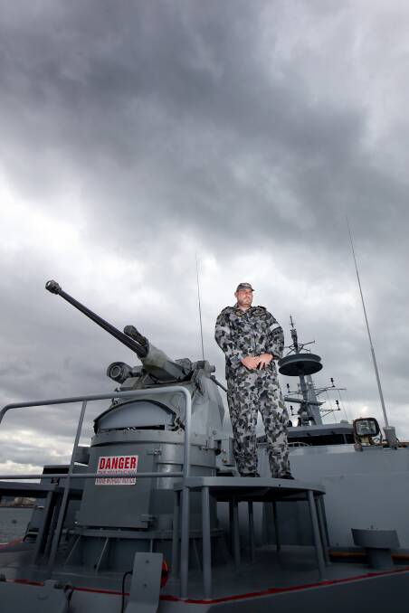 Proud Master and Commander: HMAS Wollongong's Lieutenant Commander Scott Wilson is looking forward to gaining Freedom of Entry to the city the ship he commands is named after. Pictures: Sylvia Liber. 
