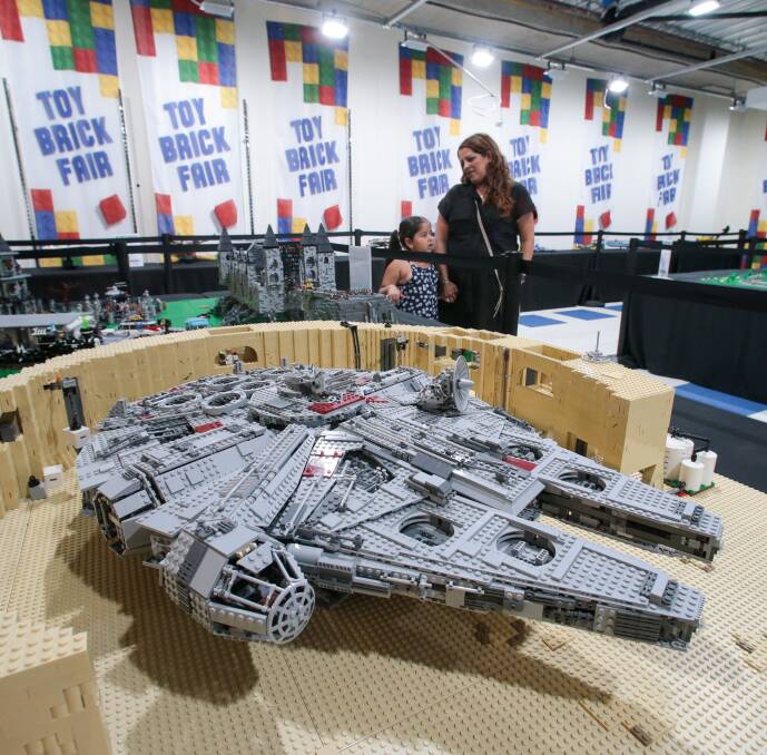 THE FORCE: Lego enthusiasts looking at the Star Wars creations at the Toy Brick Fair.