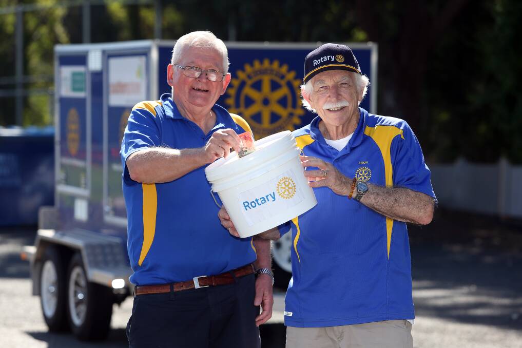 BUSHFIRE APPEAL: Rotary Club of Wollongong members Ian McKensey and Leigh Robinson who will be helping raise funds for Tathra bushfire victims at the Easter Family Fun Day at the Botanic Gardens on Saturday. Picture: Robert Peet.